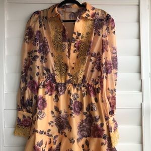 Unique floral yellow dress with long sleeves and beautiful edging